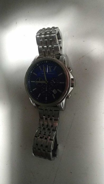 Armani Exchange e Caterpilar - 50 Euros os Dois