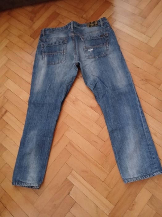 Spodnie jeans męskie z przetarciami  New Yorker  34
