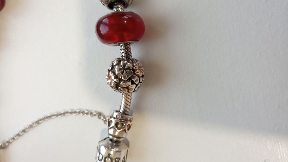 Pulseira e contas Pandora Ouro