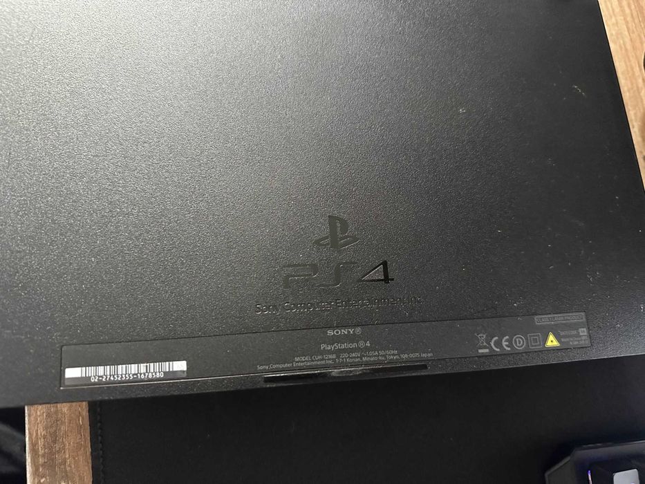 PlayStation4 fat 1TB + 2 pady + kierownica Hori + 10 gier