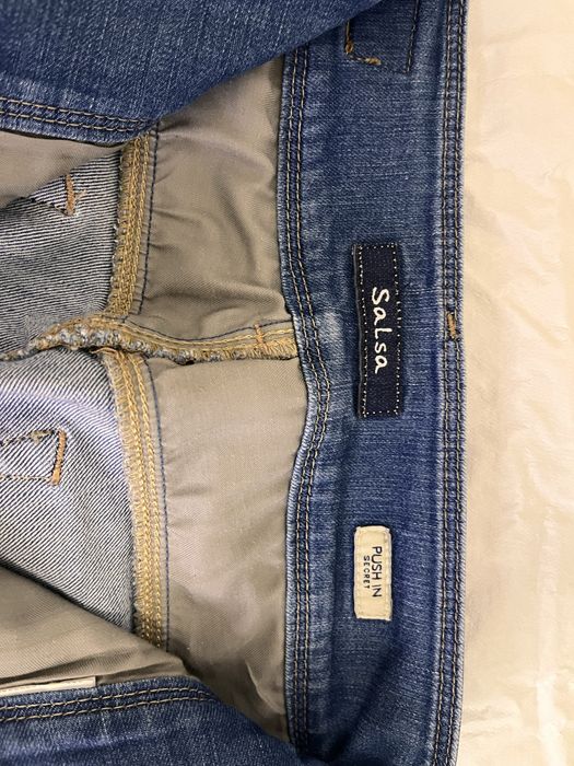 Calças de ganga slim azul médio com botões