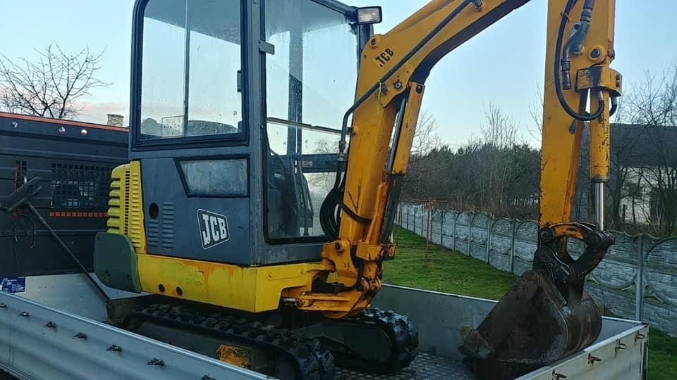 Uslugi minikoparka , koparka ,  kopanie fundamety , szamba .