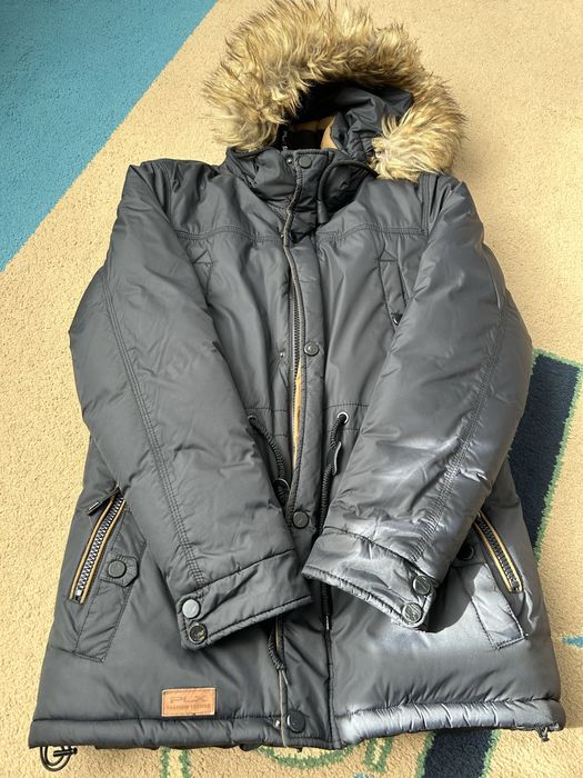 Зимовий довгий пуховик