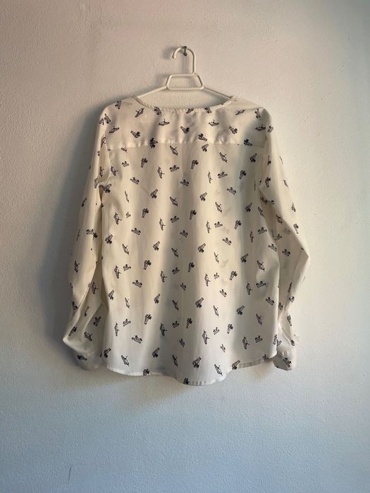 Blusa branca com padrão