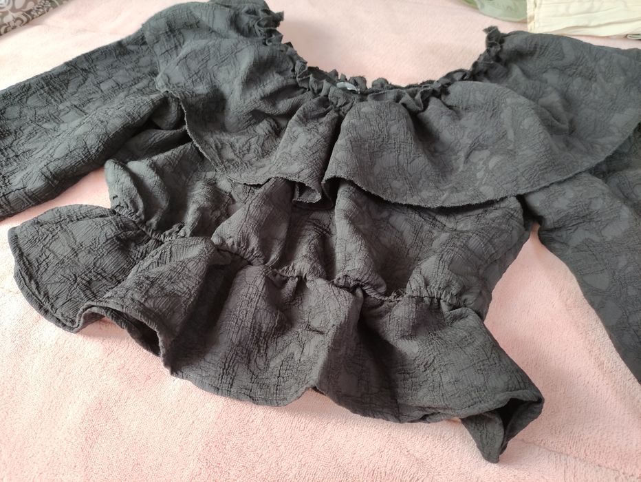 Blusa com folhos Nova