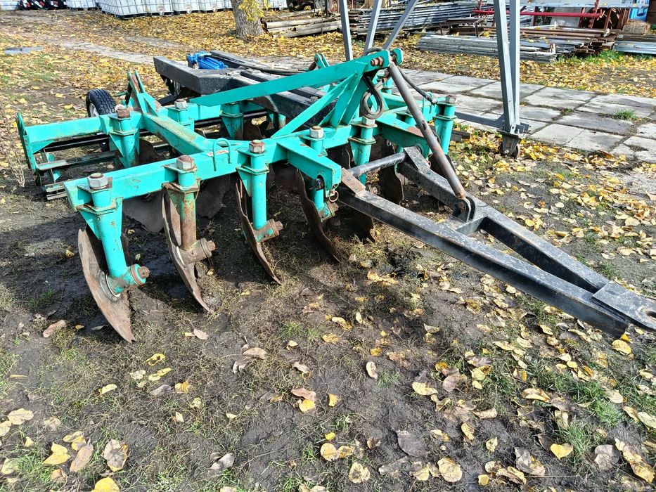 Причіпний пристрій для дискової борони