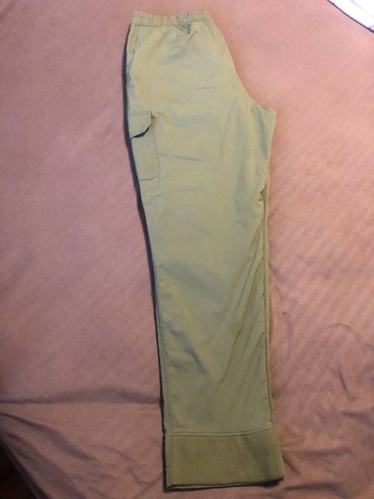 Спортивные Поло ,зеленого цвета ,состояние новых.оригинал .