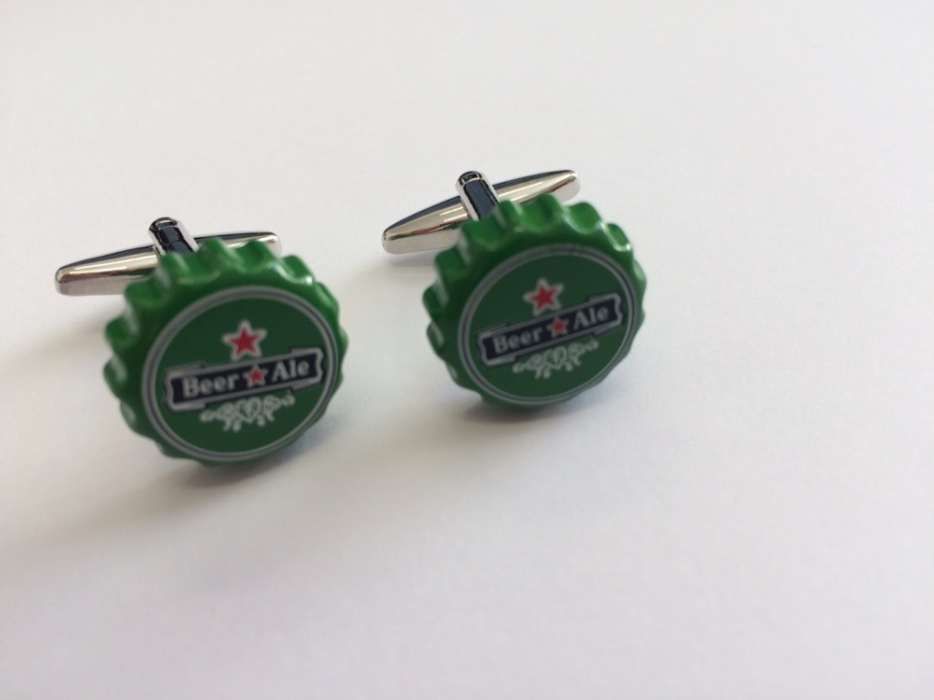 Botões de punho carica cerveja verde | Lagosta | porco