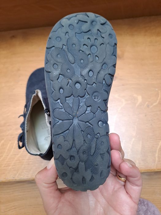 Botas em pele por dentro