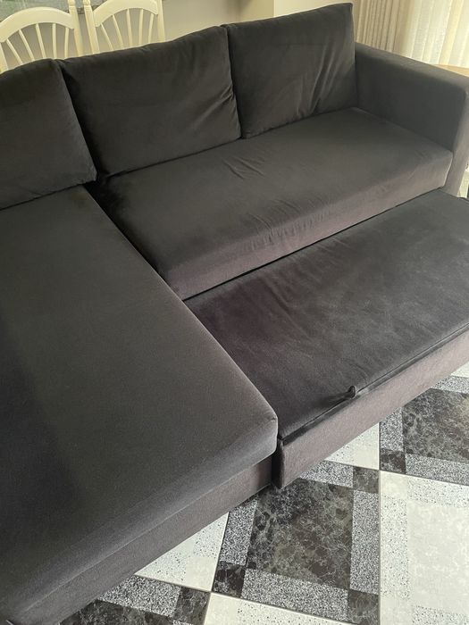 Sofa cama com chaise loungue e arrumacao