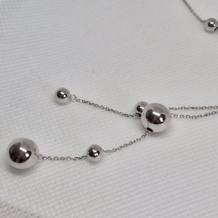 Кольє-краватка з регулюванням з білого золота. Нове. Танго.