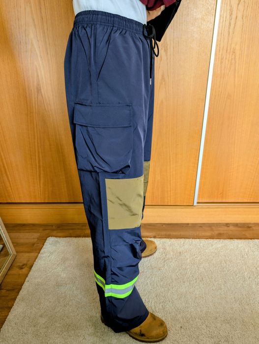 Calças de trabalho com faixas reflectoras