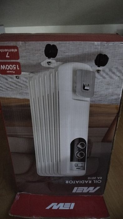 Aquecedor a Óleo MEI RA 2010 em  Branco.