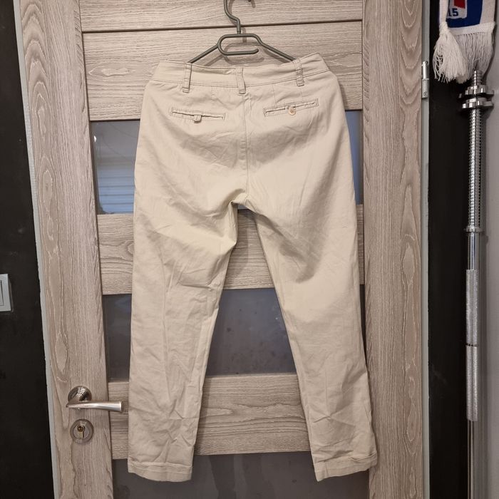 Beżowe damskie spodnie typu chino Biaggini rozm.S