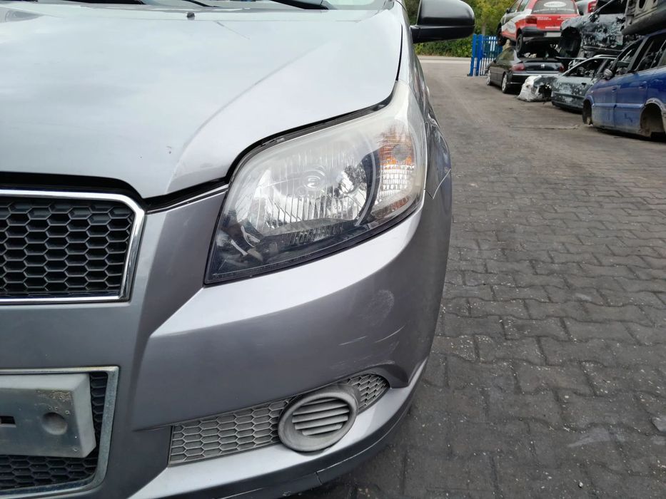 Lampa przednia lewa CHEVROLET Aveo II T255 07-12r.