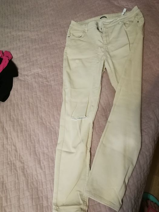 Spodnie rurki z dziurami rozm. 42