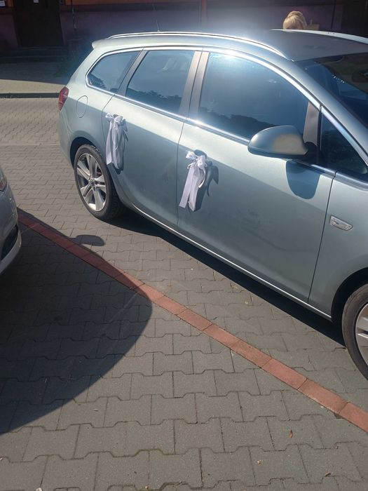 Kokardy do dekoracji klamek samochodu ślubnego