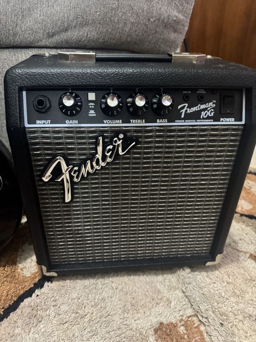 Guitarra elétrica , amplificador e cabo