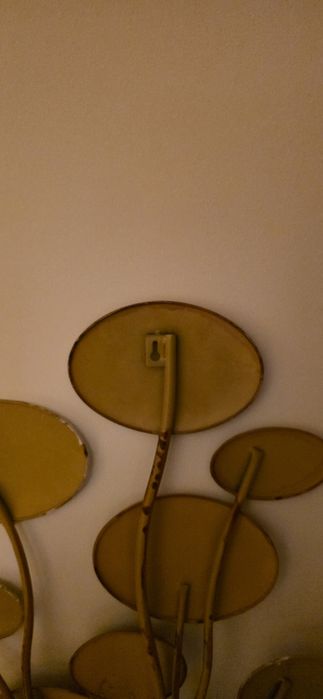 Peça decorativa de metal