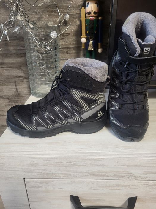 Продам зиние ботинки унисекс Salomon