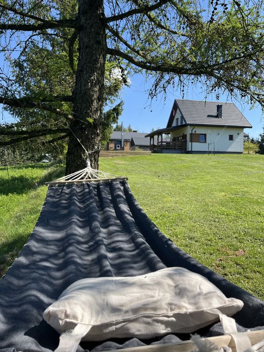 Domek z Kominkiem Nad Jeziorem z jacuzzi ogrodowym