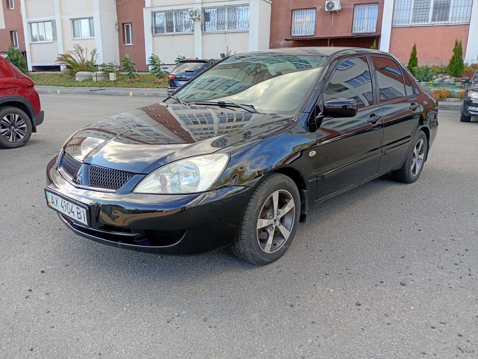 Продам  Mitsubishi lancer газ -бензин