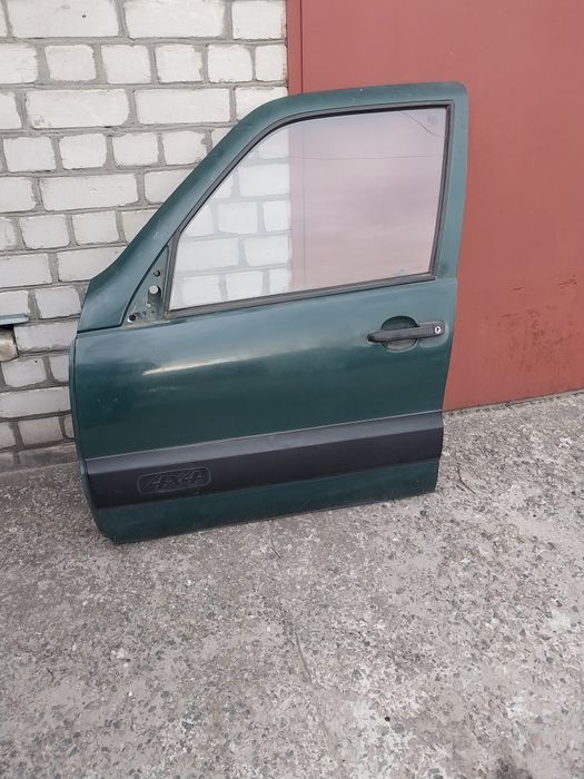 Двері нива шевроле передні і задні 2123