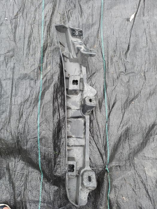 Renault Latitude ślizg lampy reflektora prawy przód uchwyt mocowanie