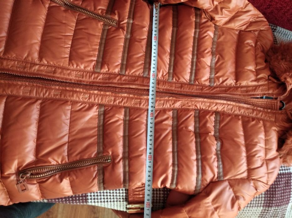 Продам жіночий пуховик, стан нового розмір Хl