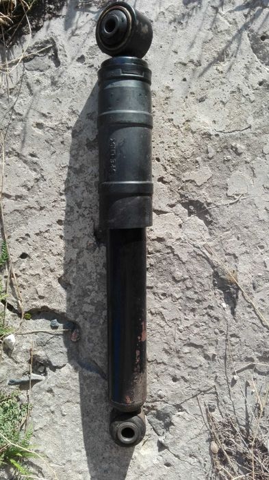 Амортизатор задній Опель