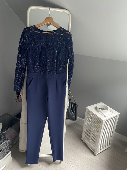 Kombinezon granatowy cekiny M nowy