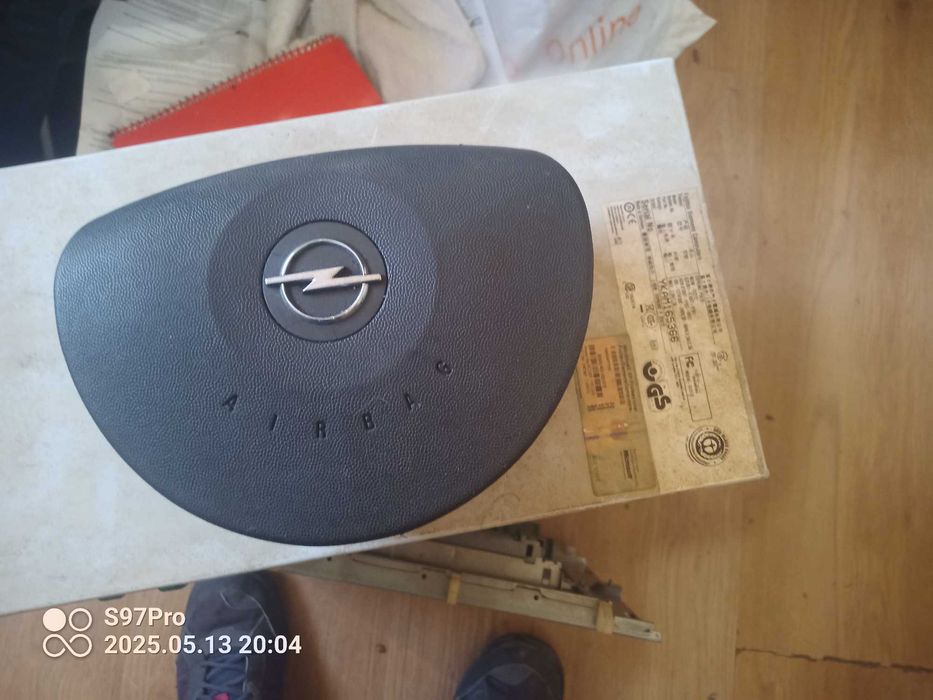 Airbag Opel   e faróis frente