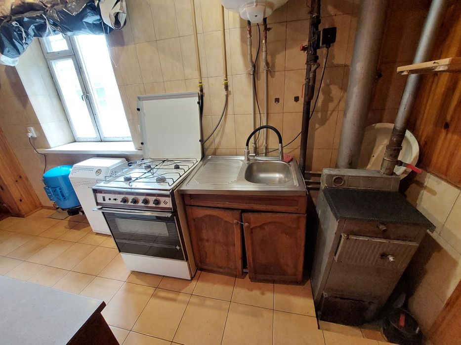 Люботин!Продам часть дома.Центр.