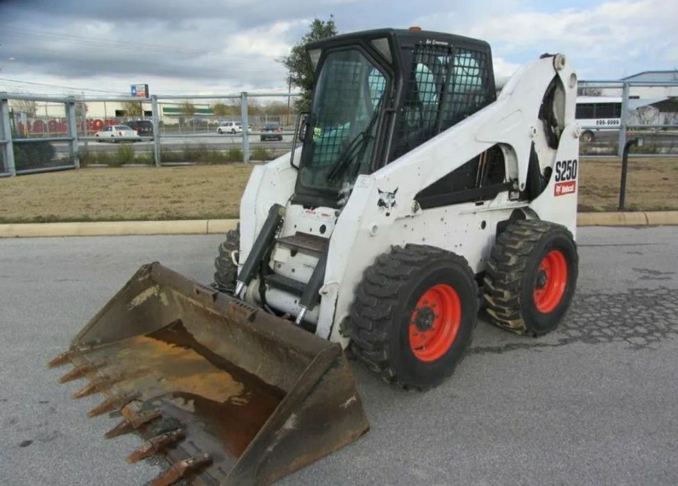 Бобкет навантажувач бобкат погрузчик вили мусор bobcat
