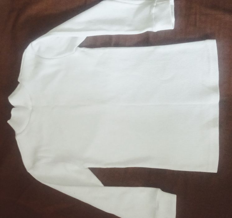 Білий гольф (водолазка) на зріст 110, 146