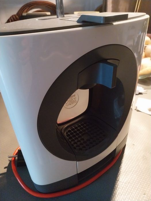 Maquina cafe capsulas dolce gusto impecavel