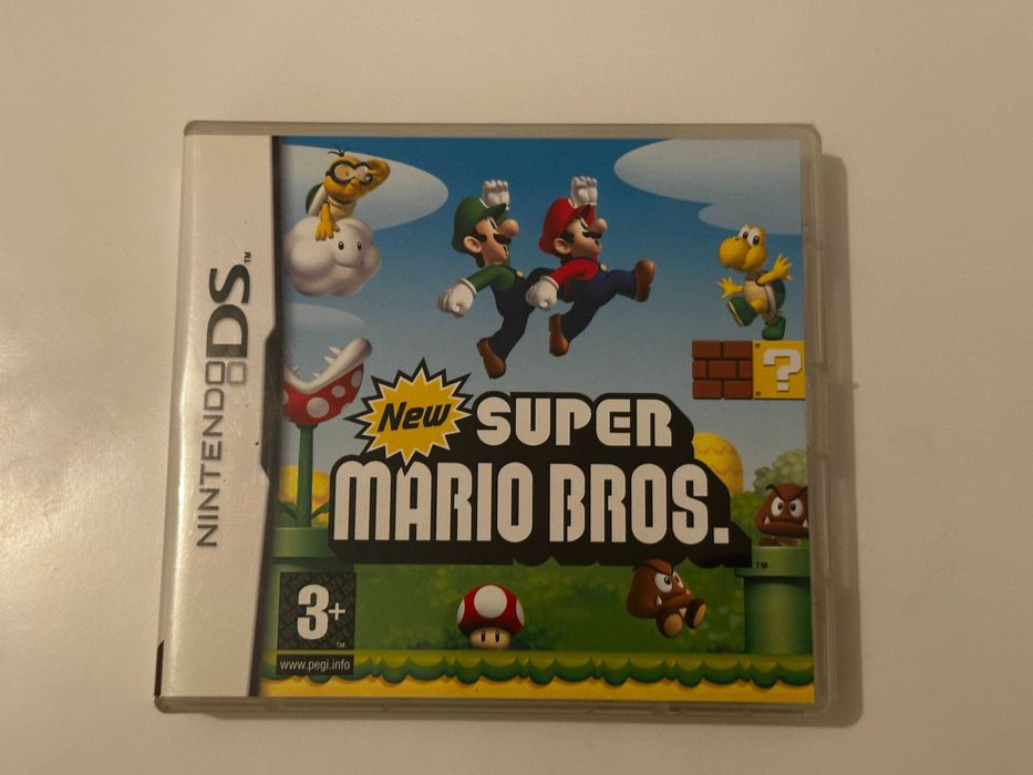 Nintendo DS (classica/Phat) azul e jogos (Mario bros, Nintendogs, etc)