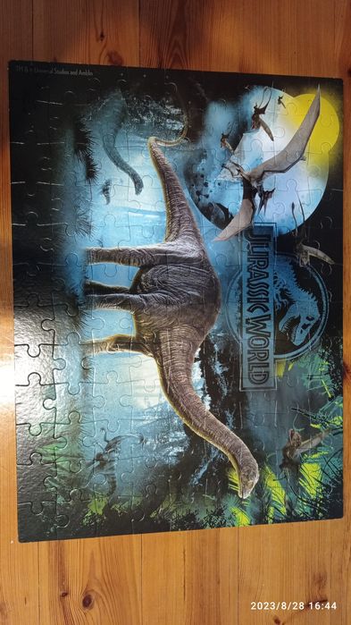 Puzzle z dinozaurami dwustronne 108 elementów Jurassic World