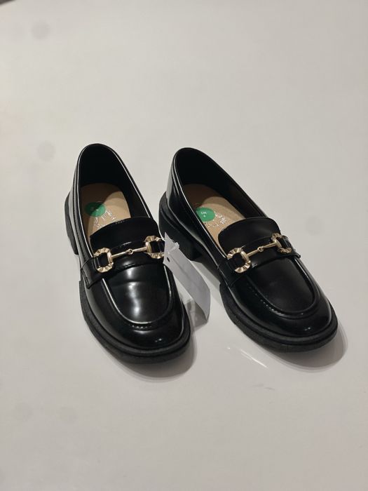 Нові туфлі лофери