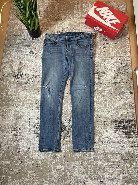 Jeansy z przetarciami meskie slim fit armani exchange selvedge