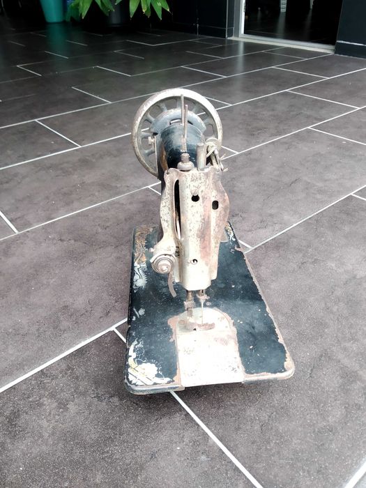 Cabeça de máquina costura