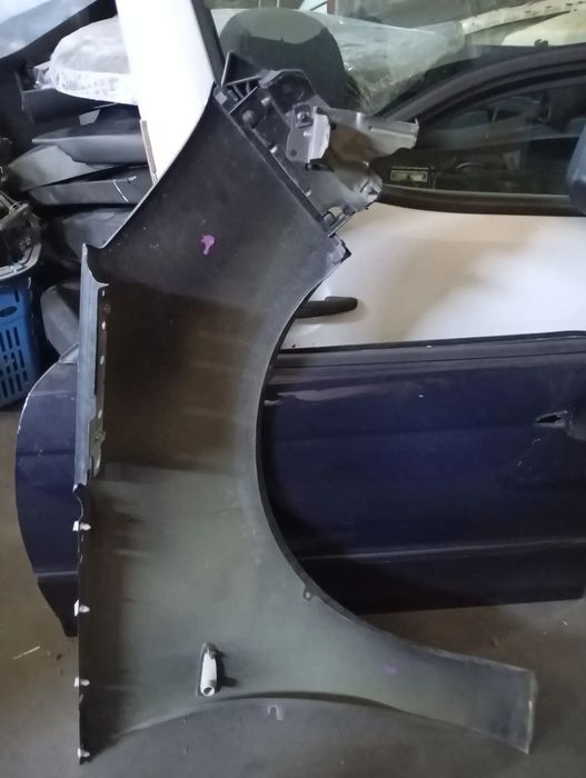 OPEL ZAFIRA C GUARDA LAMAS ESQUERDO - GL072