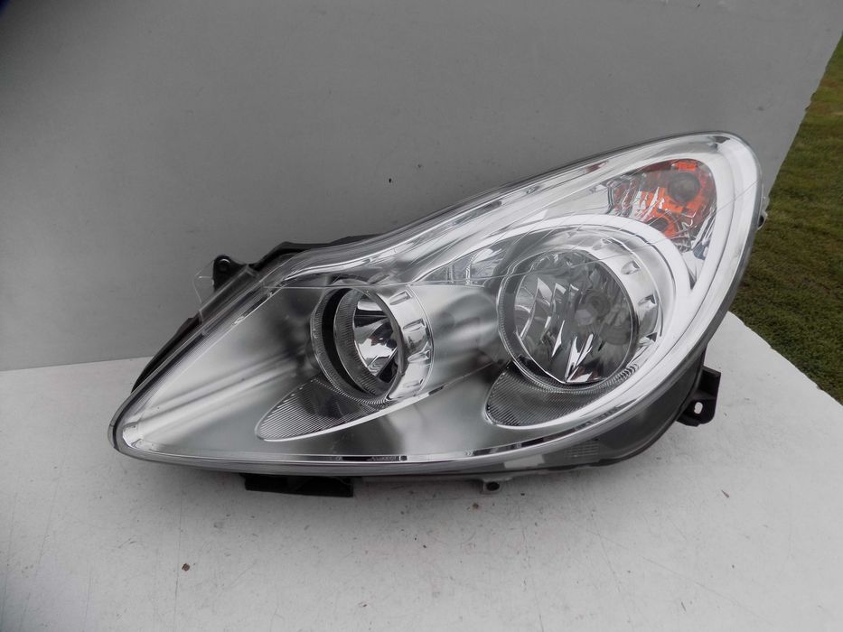 Reflektor lampa przód lewa Opel Corsa D 06-10 jak nowa Europa