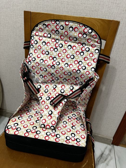 Дорожний стільчик для годування