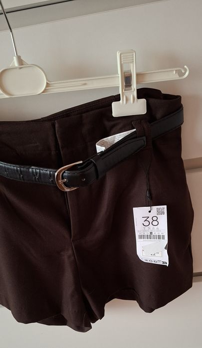 Stradivarius nowe brązowe czekoladowe spodenki z paskiem 38 M