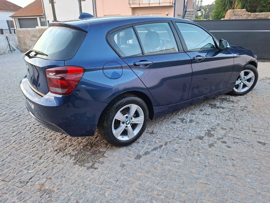 Bmw 116D com estofos em pele