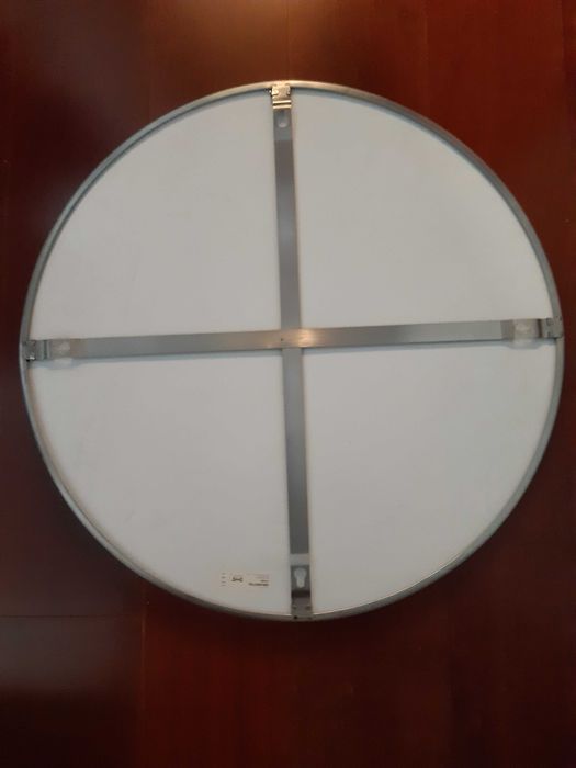 Espelho redondo.
