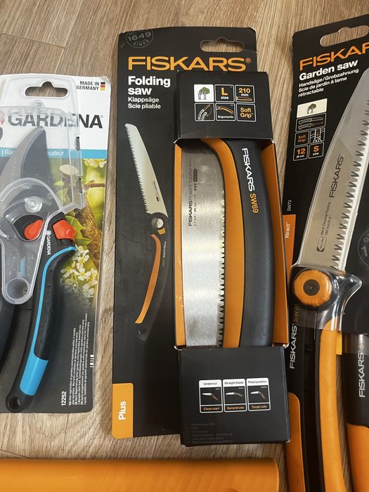 Інструменти Fiskars/Gardena, пилки, секатори, сокира