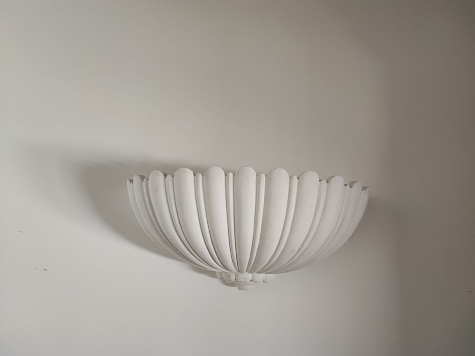 Plaster wall sconces.425519381406689281