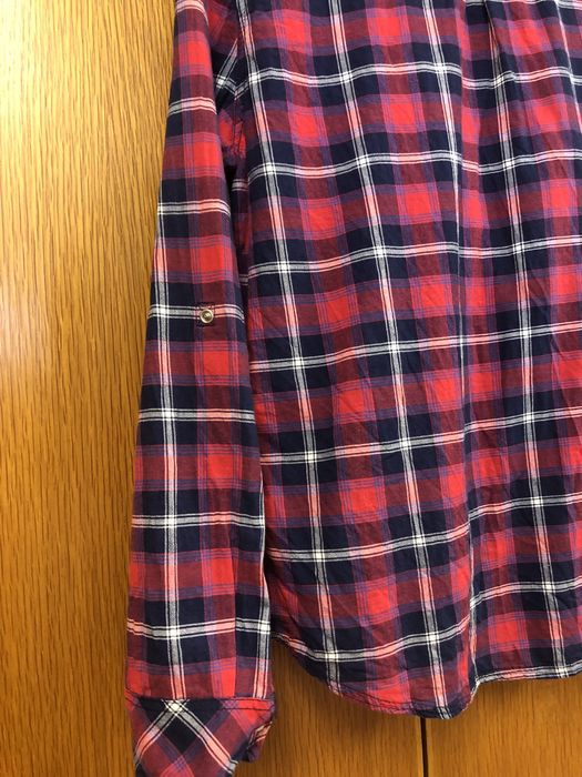 Camisa xadrez vermelha e azul